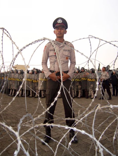 Since their separation from the armed forces in 1998, the police have competed    with the military over control of local resources / Ian Wilson